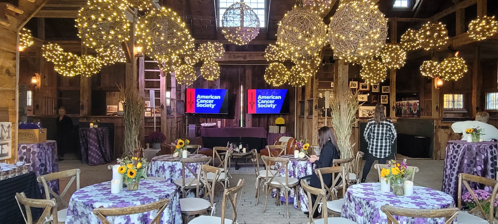 American Cancer Society gala in a lit barn