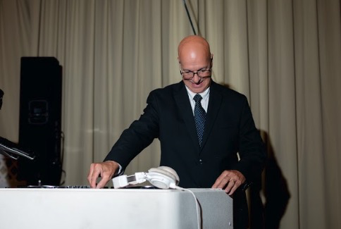 Angelo Kokkinakos DJing at a formal event